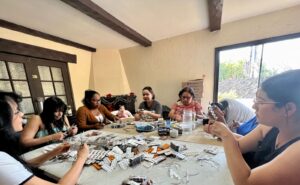 Ladies from the “Divine Providence” Church in Santiago de Chile help prepare the packages.