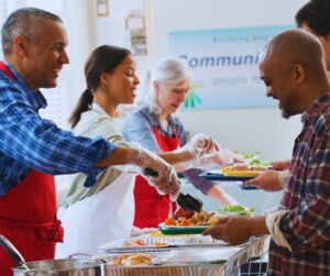 A group of people serving to others