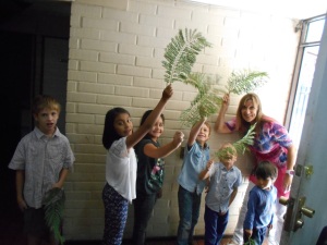 The children preparing to enter with PALMS...