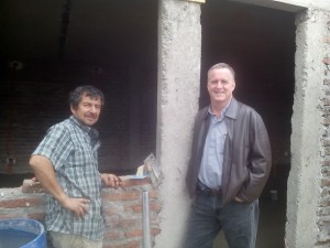 Pastor Jim with construction foreman, Arturo.